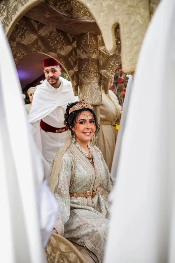 Moroccan bride in an embroidered caftan inside the amariya - Moroccan wedding photographer